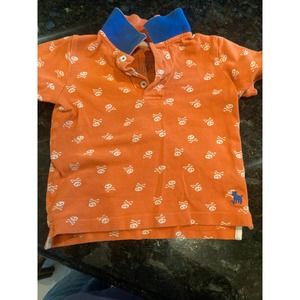 Orange Mini Boden Polo shirt with skulls & blue collar (3-4T)